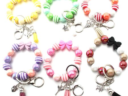 Wholesale Tassel Dragonfly Bull Head Lion Love Angel Acrylic Wrist Keychain Online