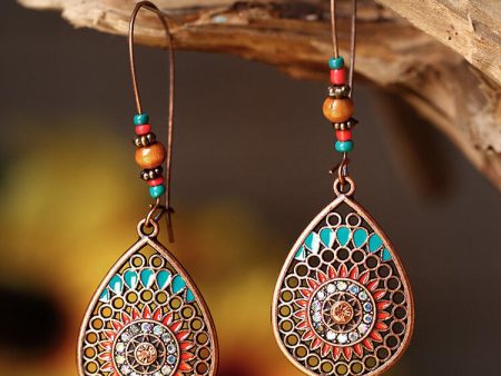 Wholesale Bohemian Fashion Hollow Teardrop-shaped Alloy Oil Drop Long Earrings Hot on Sale