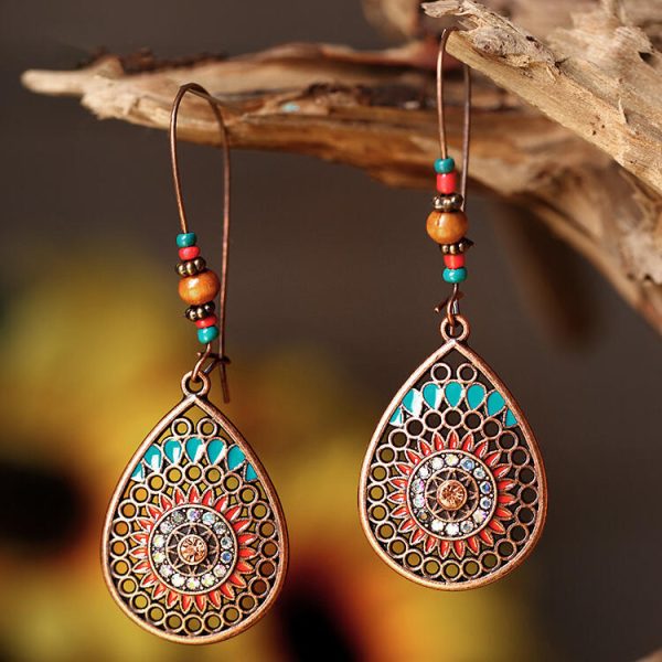 Wholesale Bohemian Fashion Hollow Teardrop-shaped Alloy Oil Drop Long Earrings Hot on Sale